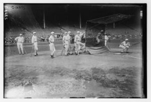 New York Giants baseball players standing around the batting cages