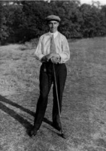 Walter Hagen posing with a golf club, taken in 1914