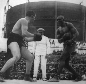 World heavyweight champion, Tommy Burns (left), and challenger Jack Johnson (right), during their championship fight on December 26, 1908