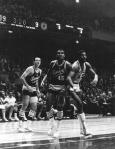 Professional basketball players Tom Meschery (left), Bob Rule (center) and Wilt Chamberlain (right)