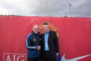 John Shiels- Director of the Manchester United Charity Foundation w/ Giovanni Pacini