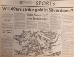 Newspaper showing 49ers vs. Bengals Super Bowl in the Silverdome