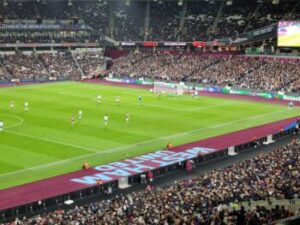 West Ham United FC stadium at night during the European fixture against Sevilla